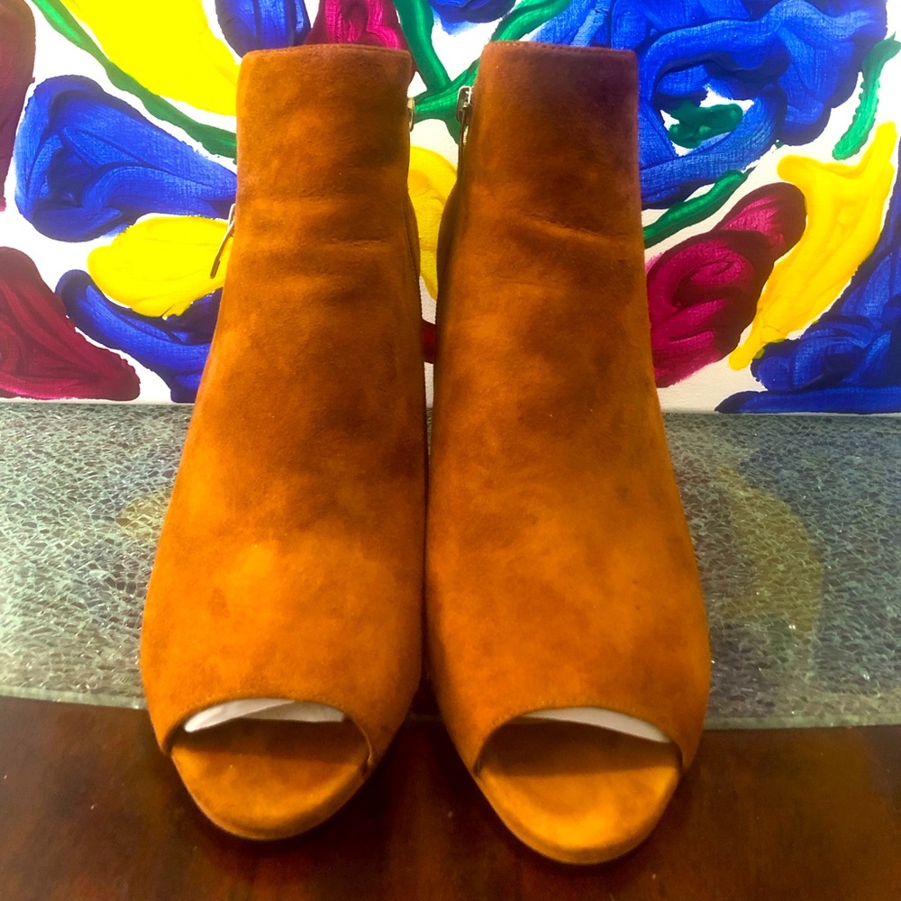 Marc Fisher brown open toe booties with zippers.